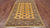 Gold 5' 8" X 8' 0" Silky Bokhara Hand-Knotted Wool Rug - Q24628
