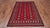 Red 5' 7" X 7' 9" Silky Bokhara Hand Knotted Wool Rug - Q24665